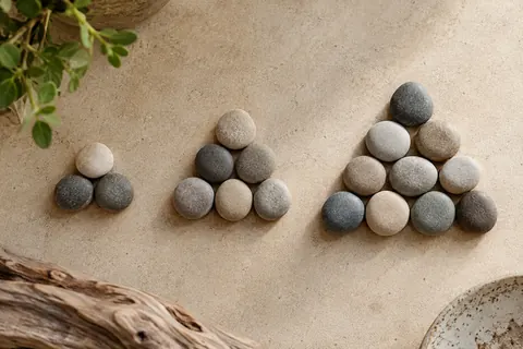 Pebbles arranged in growing groups