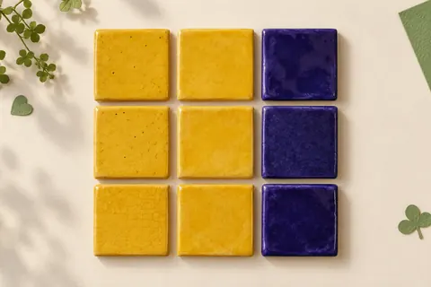 Nine ceramic tiles arranged in three equal rows and three equal columns